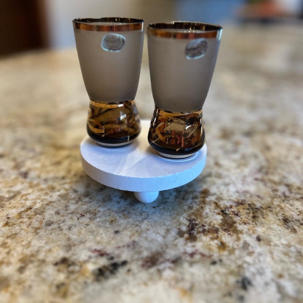 Bohemia Crystal frosted shot glasses with gold trim and leaf pattern.